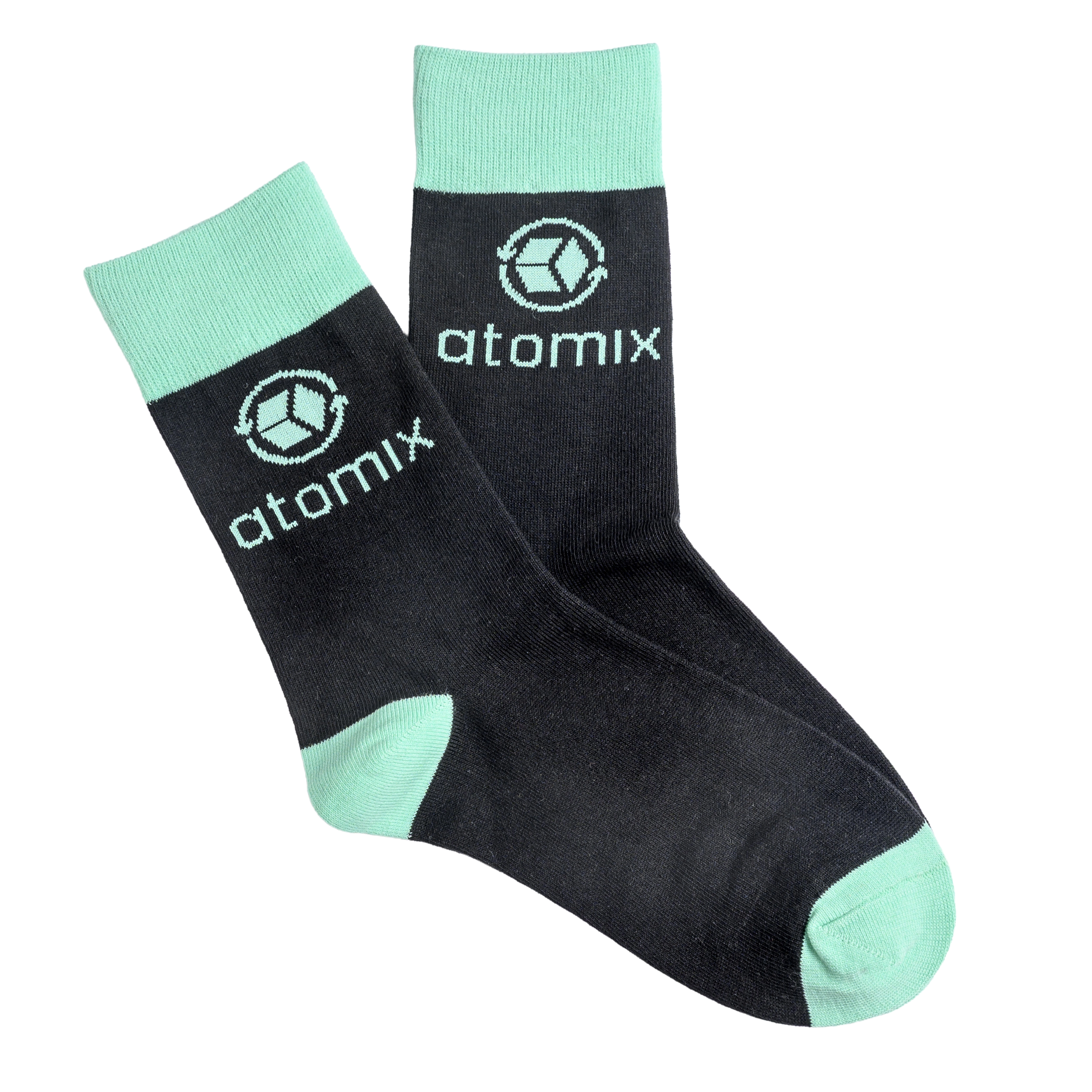 A pair of black socks with light green cuffs, heels, and toes, featuring the 'atomix' logo.