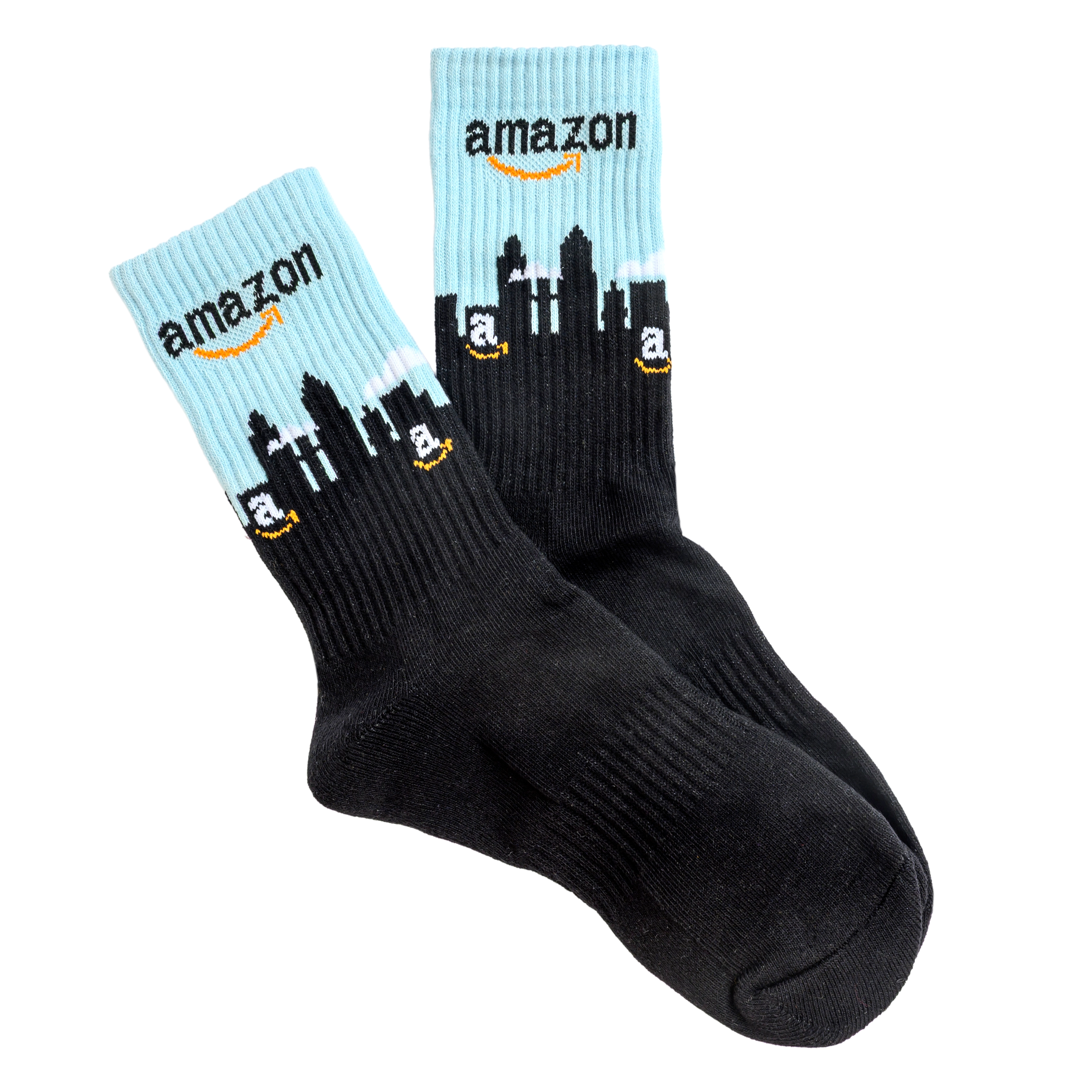A pair of black and light blue socks featuring the Amazon logo and a city skyline.