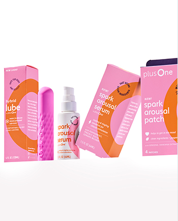 Selection of pink intimate product packaging against a white background.