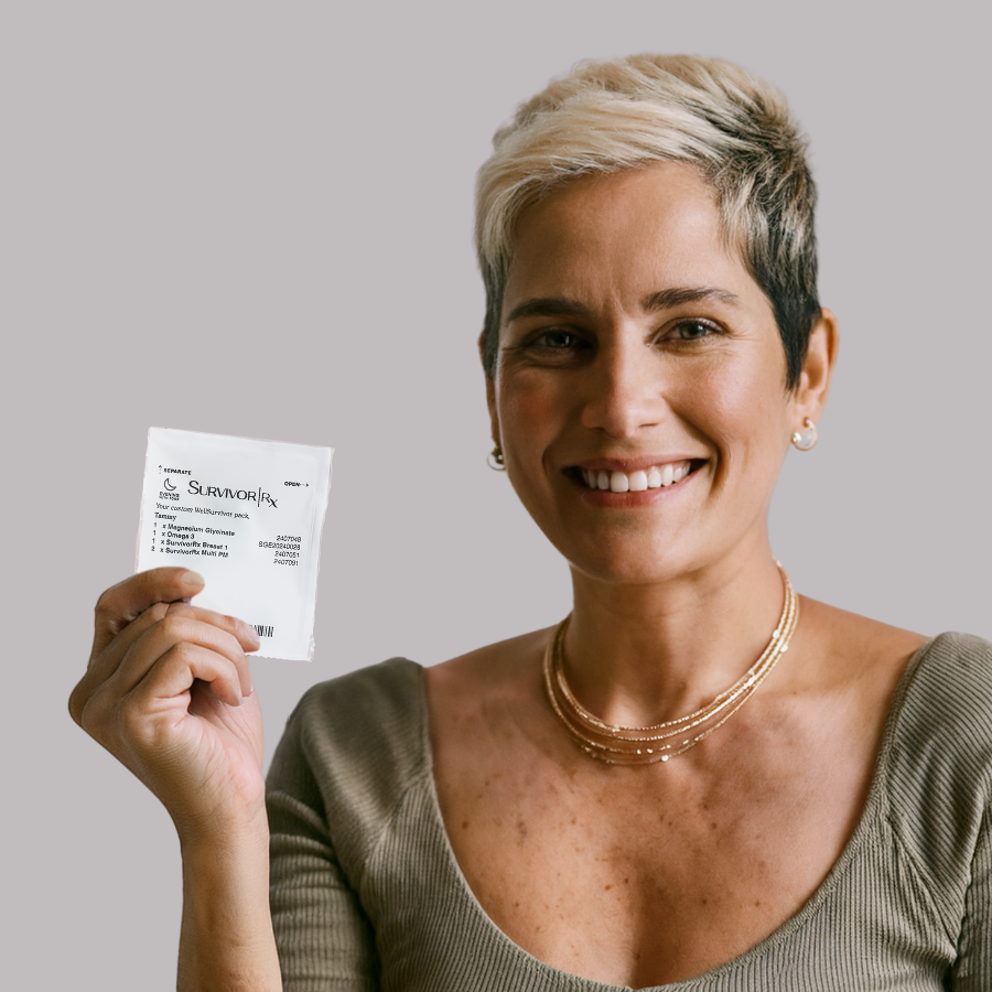 Person smiling, holding a small white packet labeled 'Survivor Rx.'