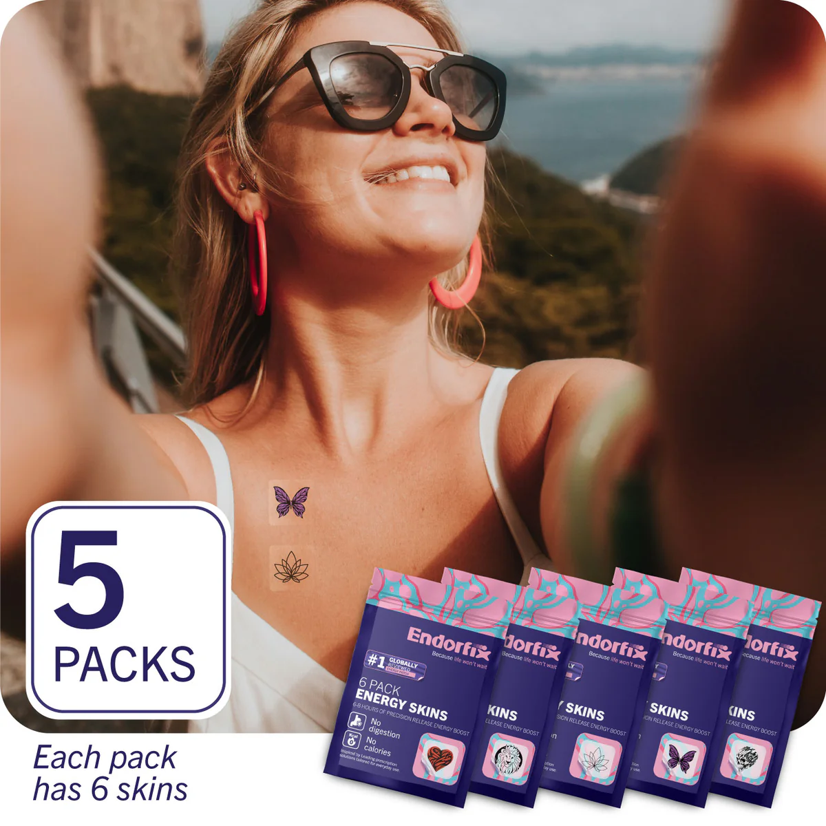 Smiling woman taking a selfie with Endorfix energy skin packs displayed.