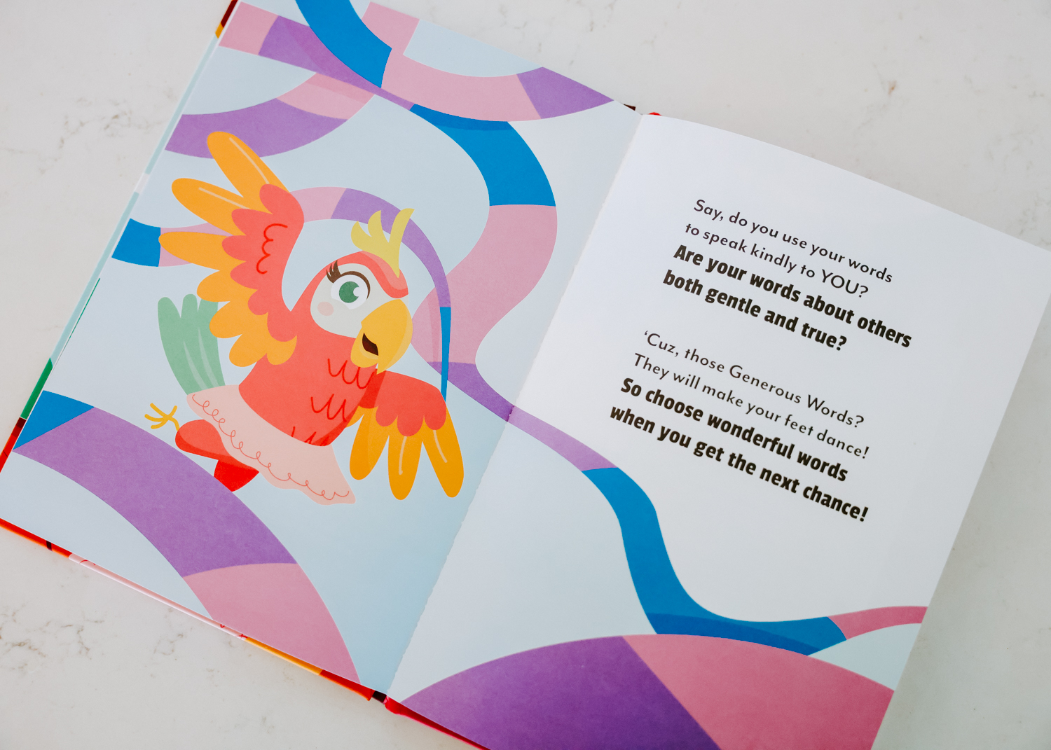 An open children's book with a colorful illustration of a parrot next to a page with text.