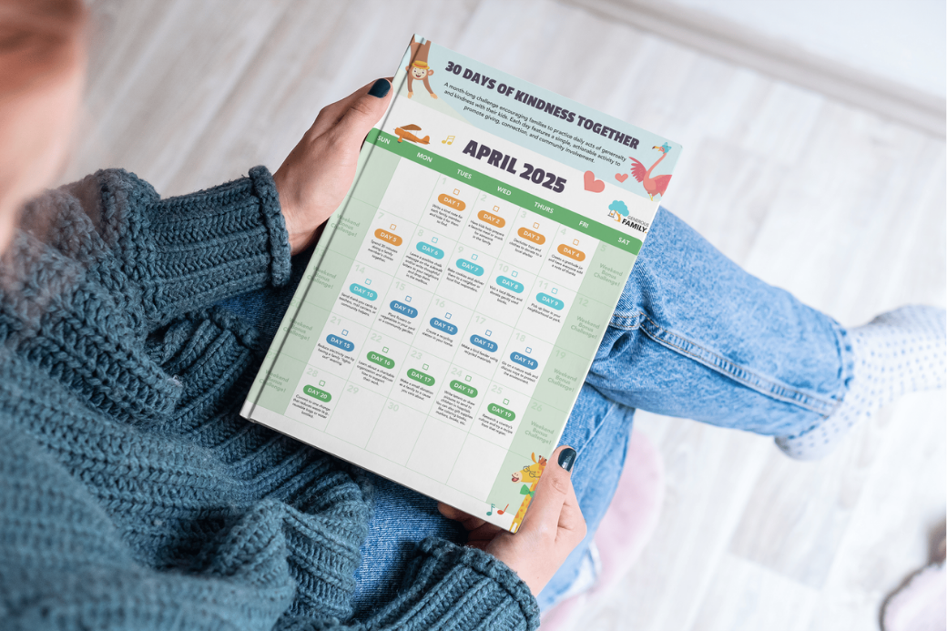 Person holding a calendar titled '30 Days of Kindness Together' for April 2025.