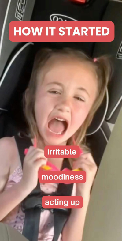 Child in a car seat, looking upset, with text overlays.