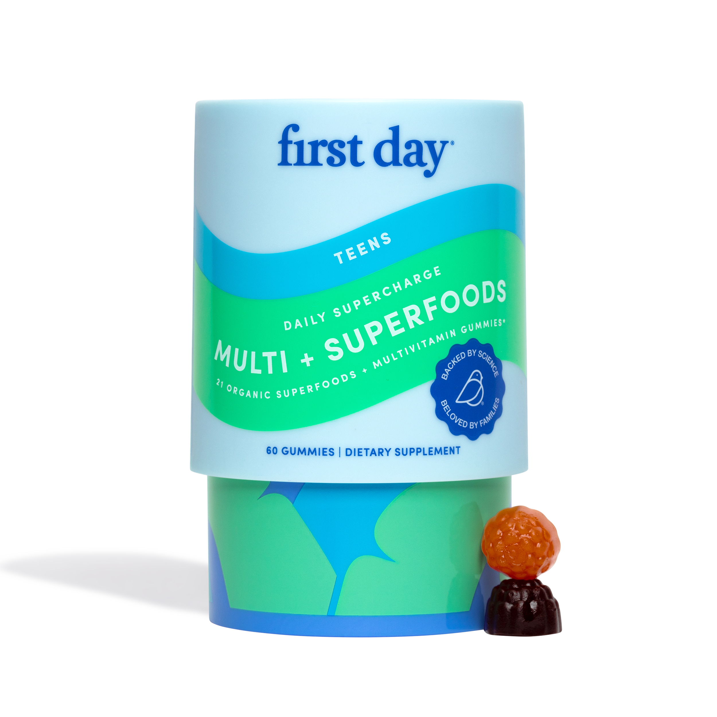 Container of multivitamin gummies with two gummies in front.