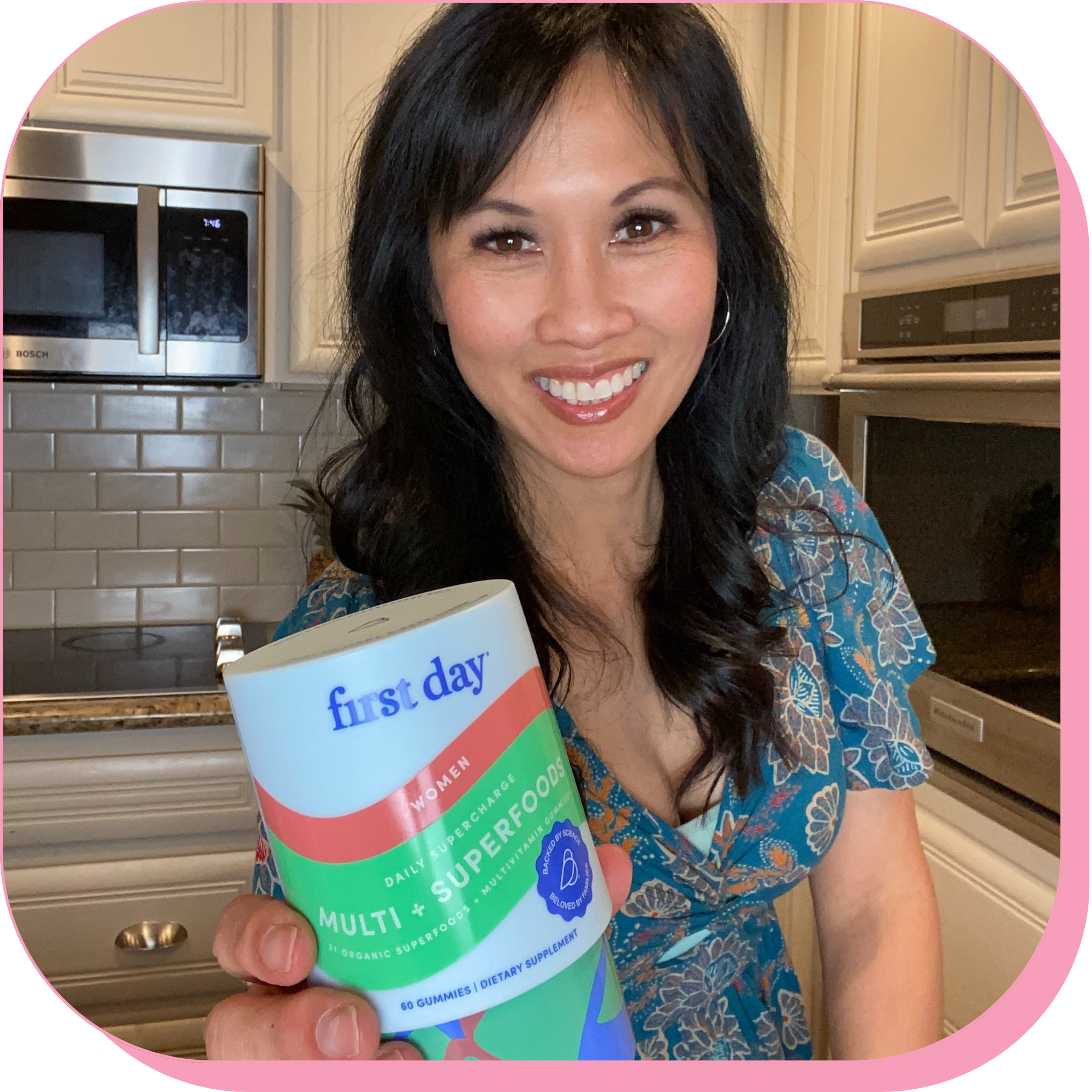 Person holding a container labeled 'first day' in a kitchen.