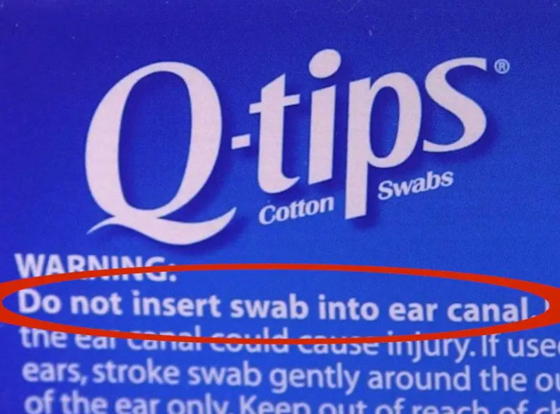Q-tips packaging with warning: Do not insert swab into ear canal.