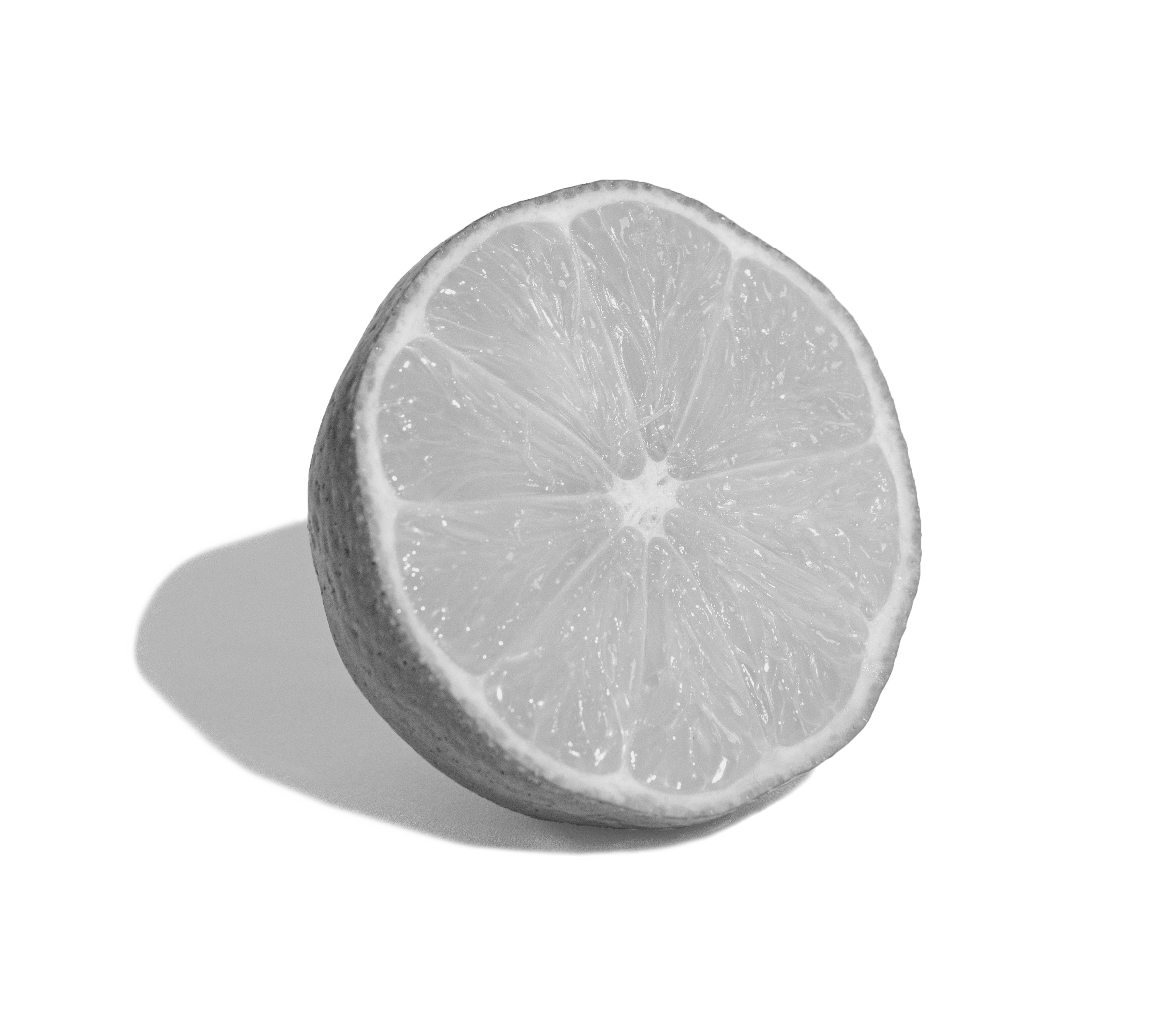 Black and white image of a sliced lemon.