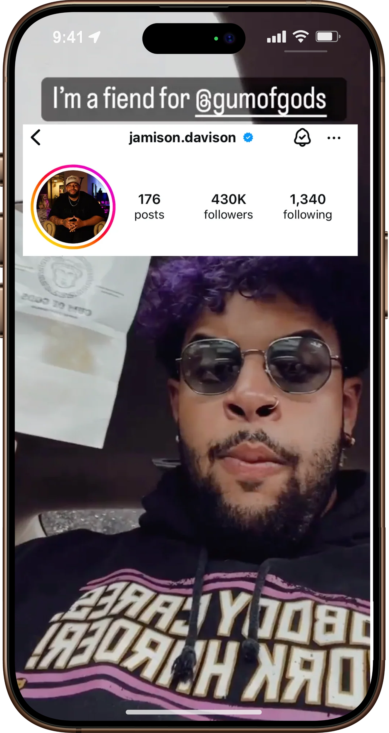 Person with sunglasses and purple hair holding a paper, Instagram profile overlayed.