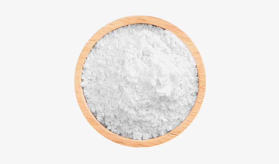 A wooden bowl filled with white powder on a white background.