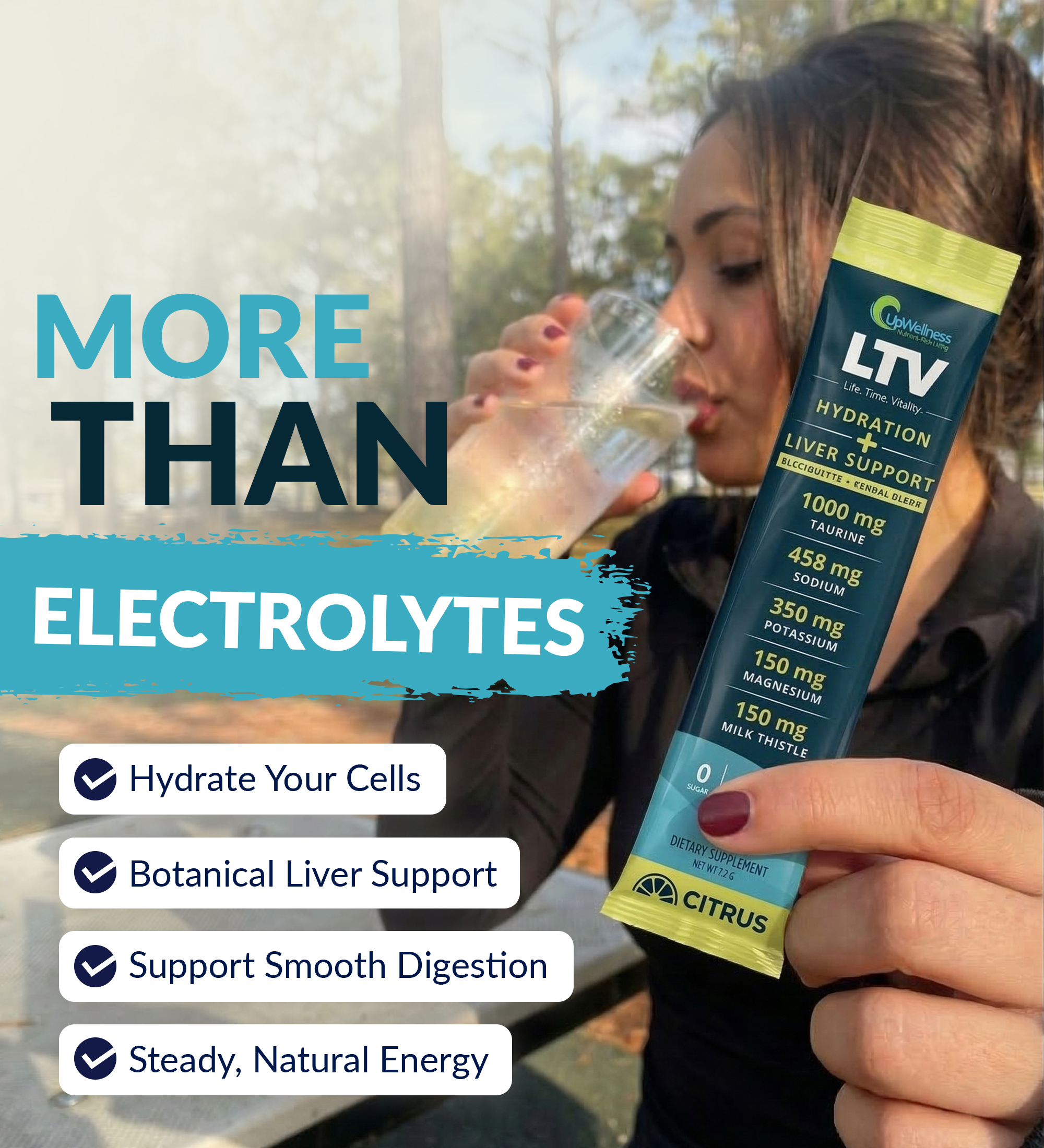 Woman drinks from a glass, holding an electrolyte supplement packet.