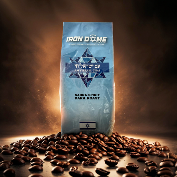 Bag of Iron Dome coffee surrounded by coffee beans.