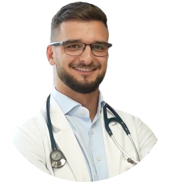 Smiling person wearing glasses and a stethoscope.