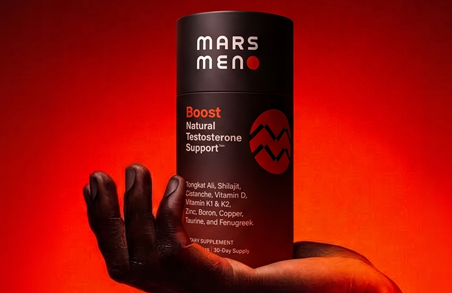A hand holds a black bottle of Mars Meno Boost testosterone support against a red background.