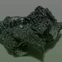 A close-up of a dark, crystalline, rock-like substance with a slight sheen against a grey background.