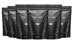 Six black pouches of ZYGO Sculpt Skin product arranged in a fan shape against a dark background.