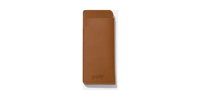 Brown leather glasses case with 'pair' embossed on it.