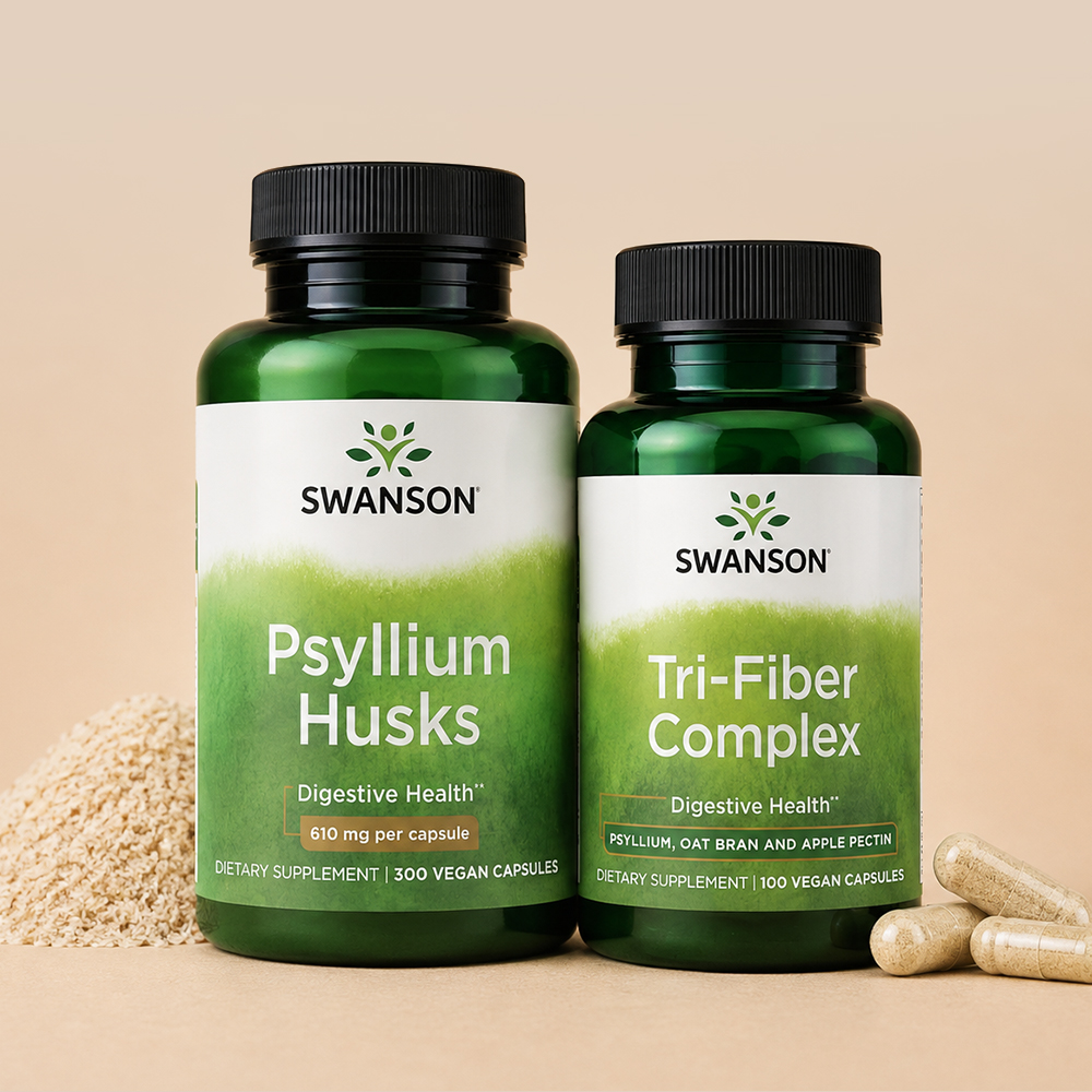 Two Swanson fiber supplements, Psyllium Husks and Tri-Fiber Complex, displayed on a beige background with fiber powder and capsules.