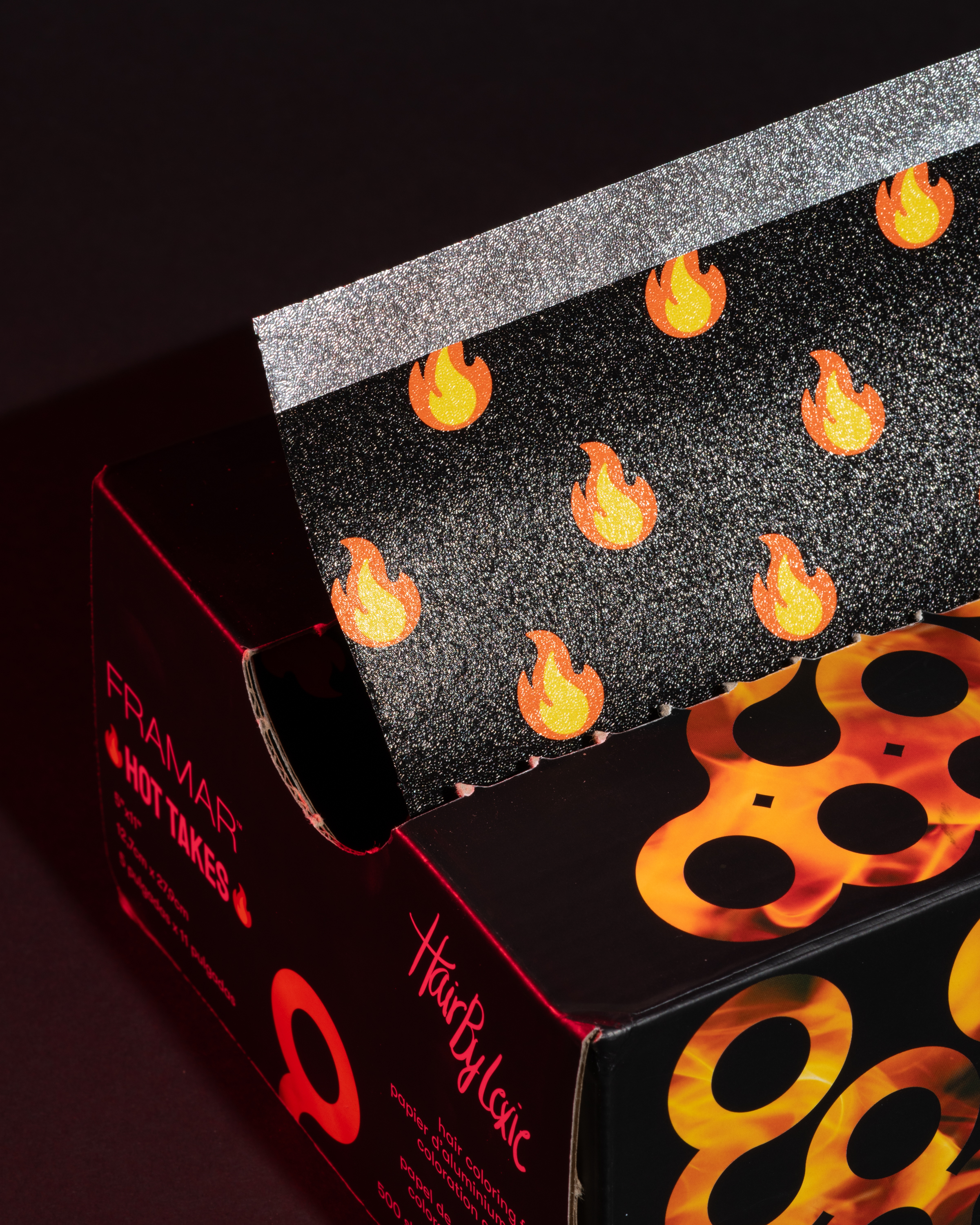 Box of hair coloring foil with flame pattern design.