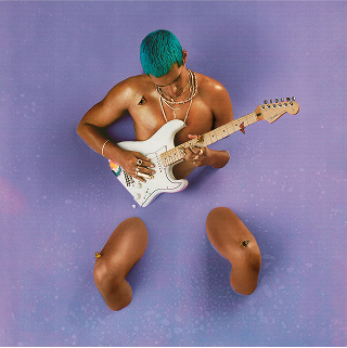 Person with blue hair playing electric guitar on purple background.