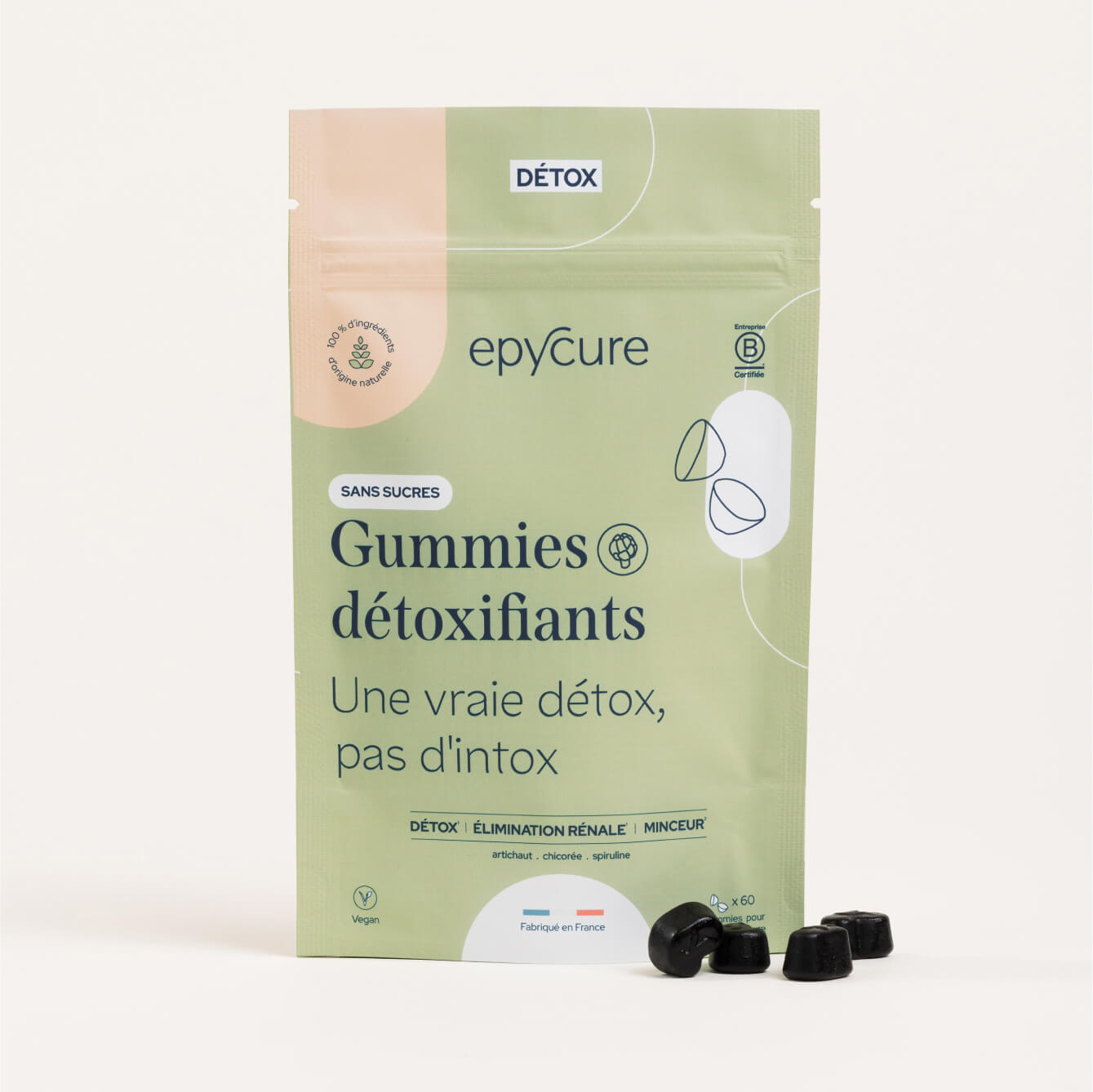 Package of sugar-free detoxifying gummies with scattered gummies near the base.