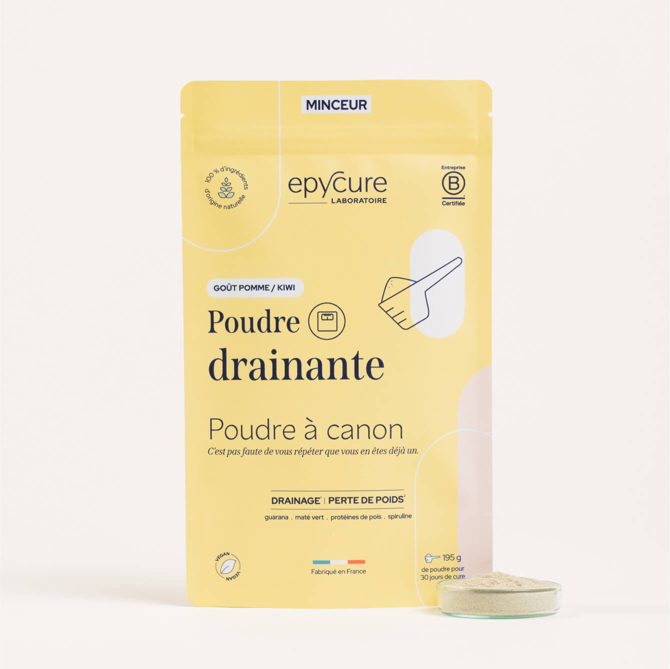 Yellow pouch of drainage powder, labeled 'Poudre drainante,' with a small dish of the powder.