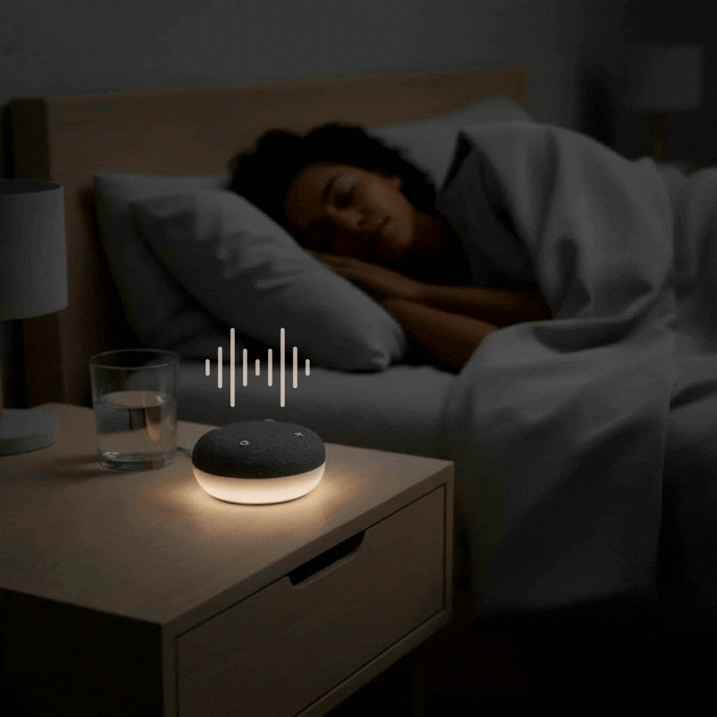Timelapse of person in bed sleeping overnight next to SNOOZ Go device. 