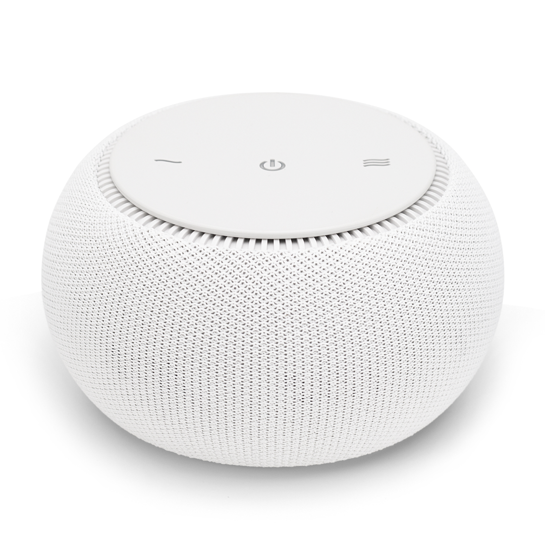 A white, spherical sound machine with a fabric-textured body and a flat control panel on top.