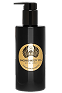 Black bottle with a pump and a gold label.