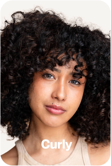 Person with curly hair and a neutral expression, labeled 'Curly.'