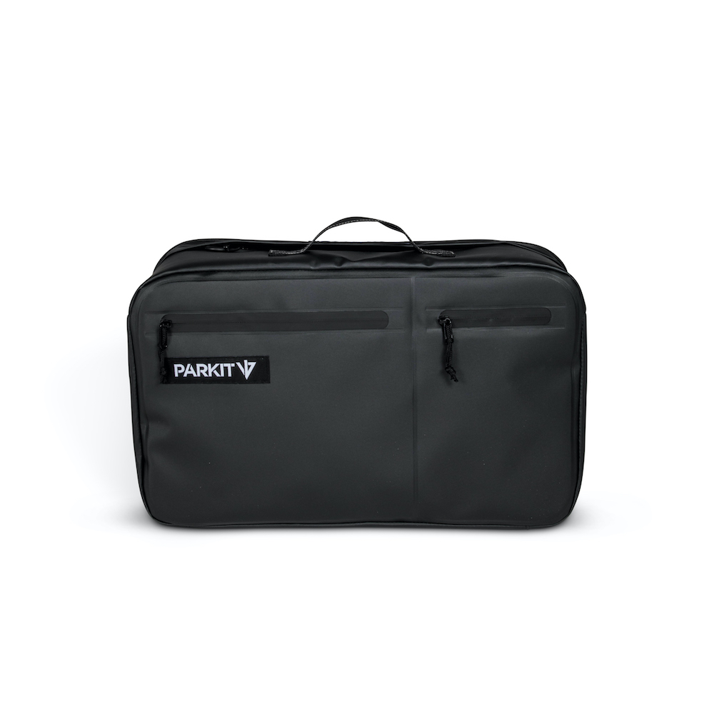 A black rectangular bag with a top handle, front zippers, and a 'PARKIT' logo against a white background.