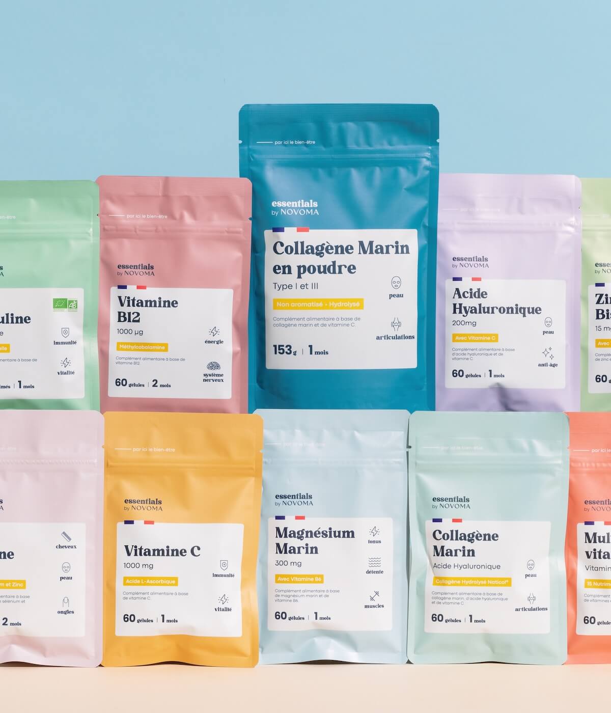 Colorful packaging of various dietary supplements displayed against a blue background.