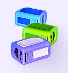Three colorful rectangular pencil sharpeners in blue, green, and purple.
