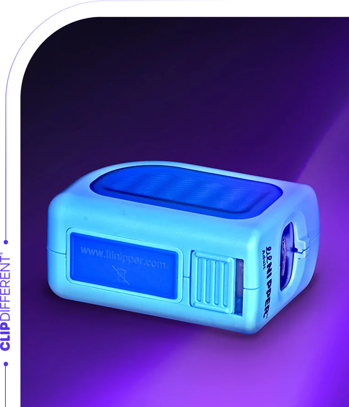 A blue and purple illuminated box-shaped device on a purple background.