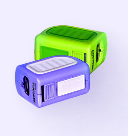 Two colorful pencil sharpeners, one green and one blue, placed diagonally against a light background.