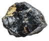 A lustrous, black rock with a patch of gold on its surface, against a solid green background.