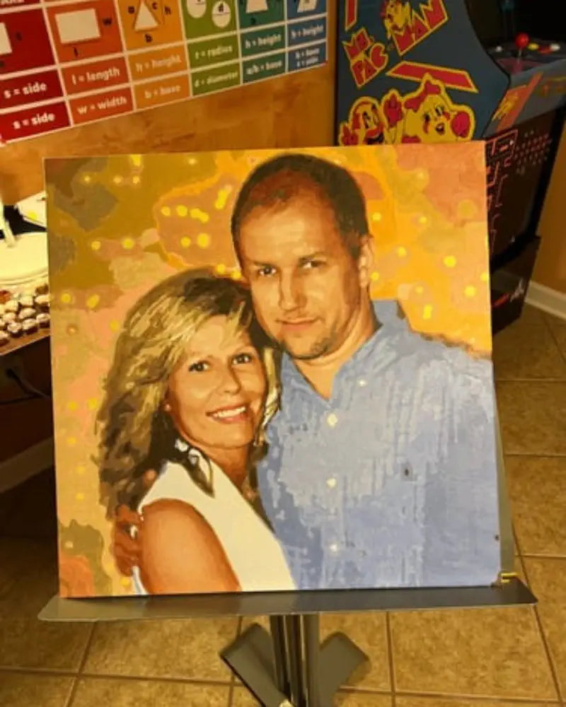 Painting of a smiling couple with educational posters and arcade machine in the background.