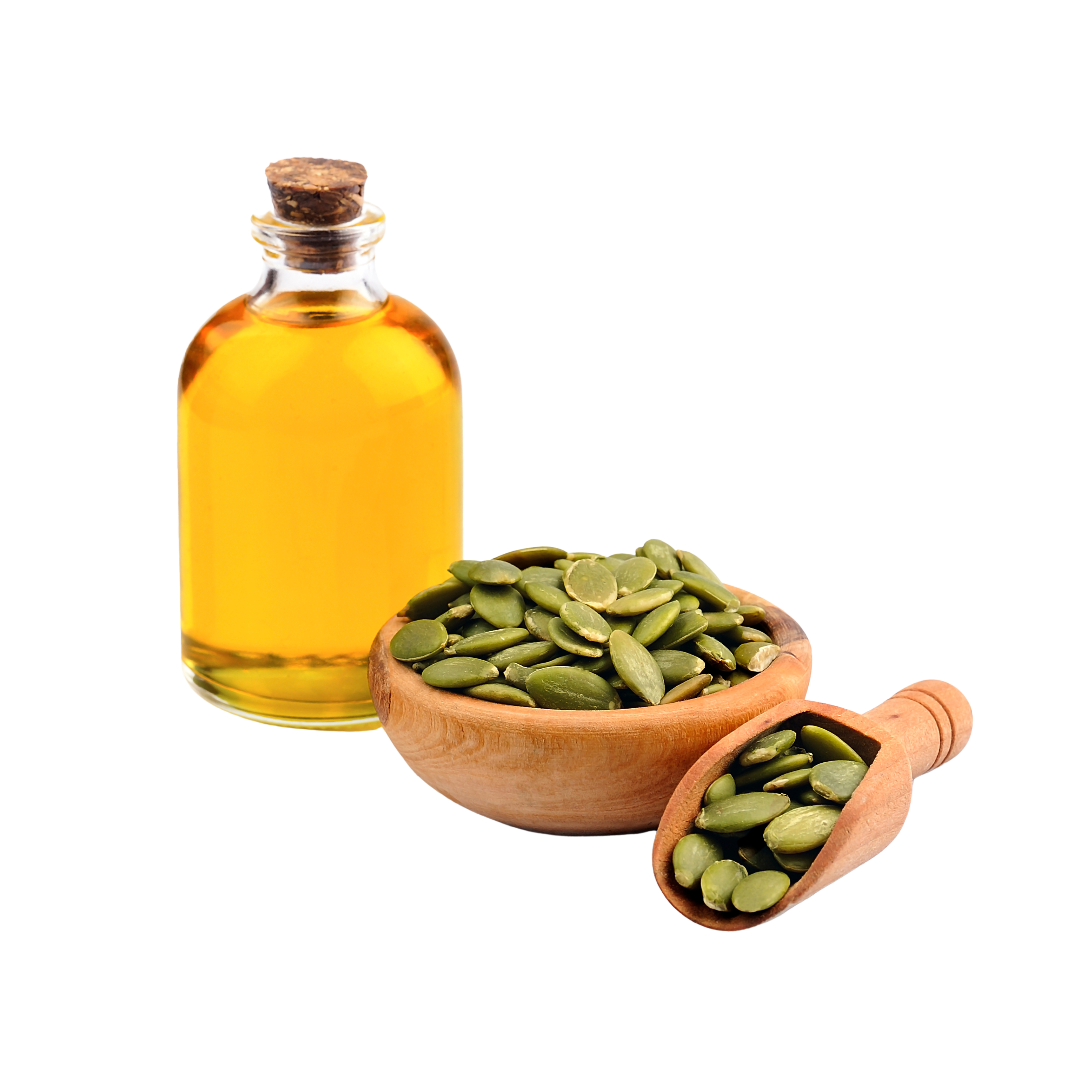 Bottle of oil with pumpkin seeds in a bowl and scoop.