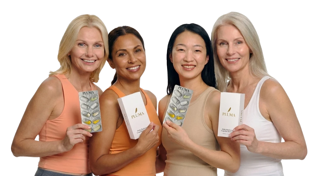 Four smiling women of varying ethnicities hold up boxes and blister packs of a product called Pluma.