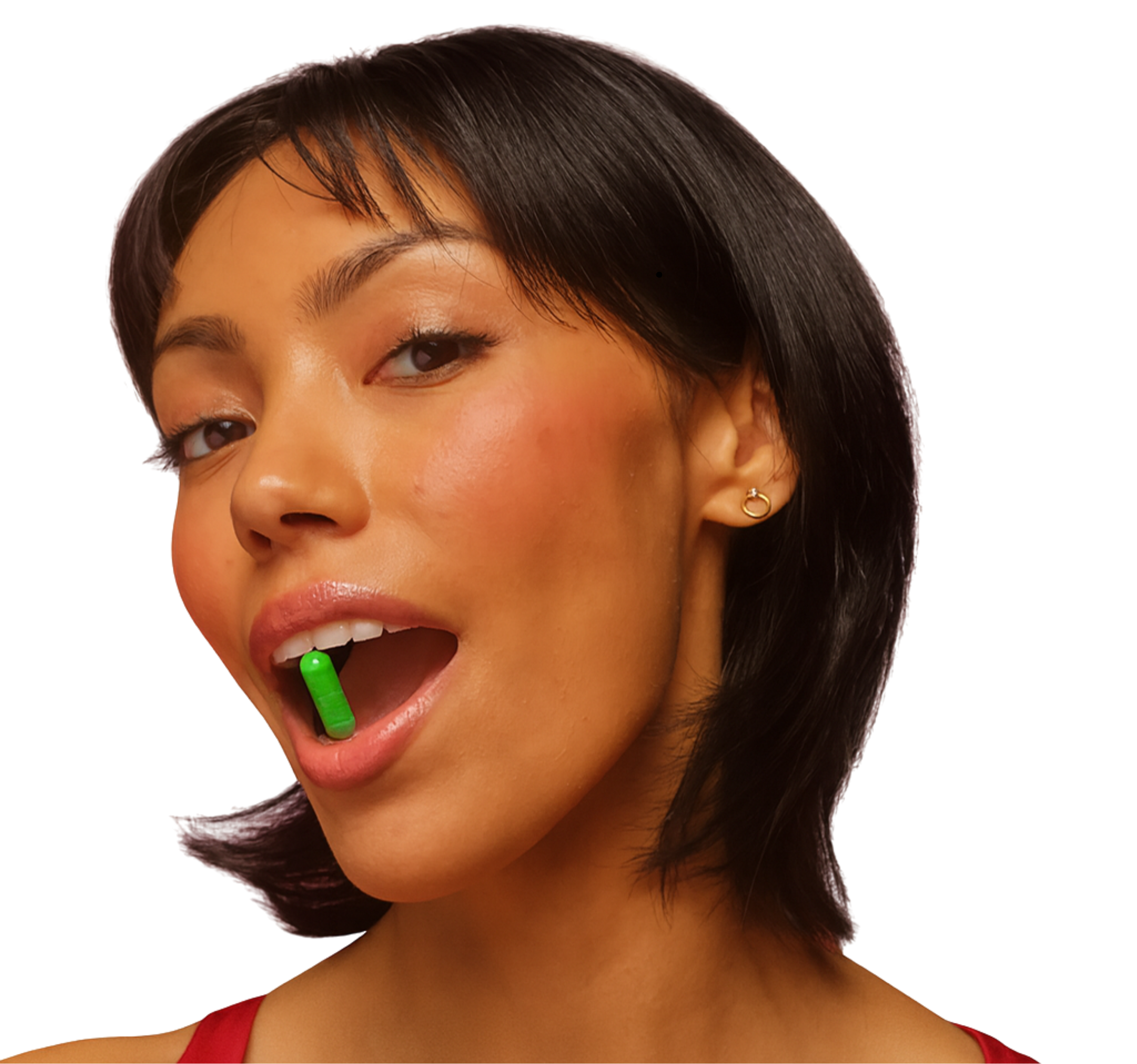 Person with short hair holding a green capsule in their mouth.