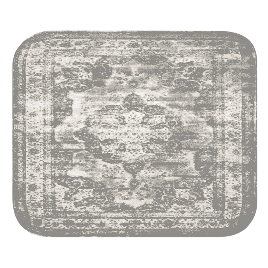 Gray, vintage-style rug with a faded ornate pattern.