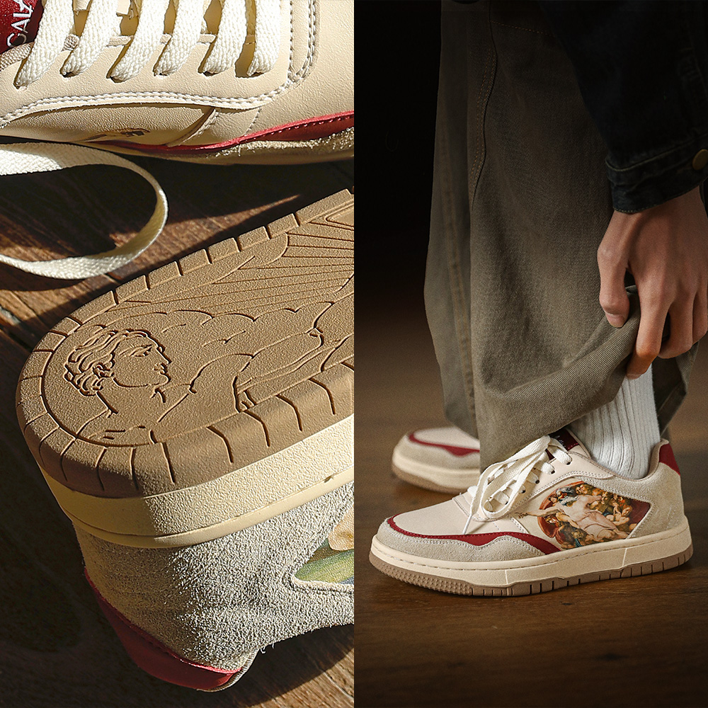 Designer sneakers with detailed sole and art print on side.