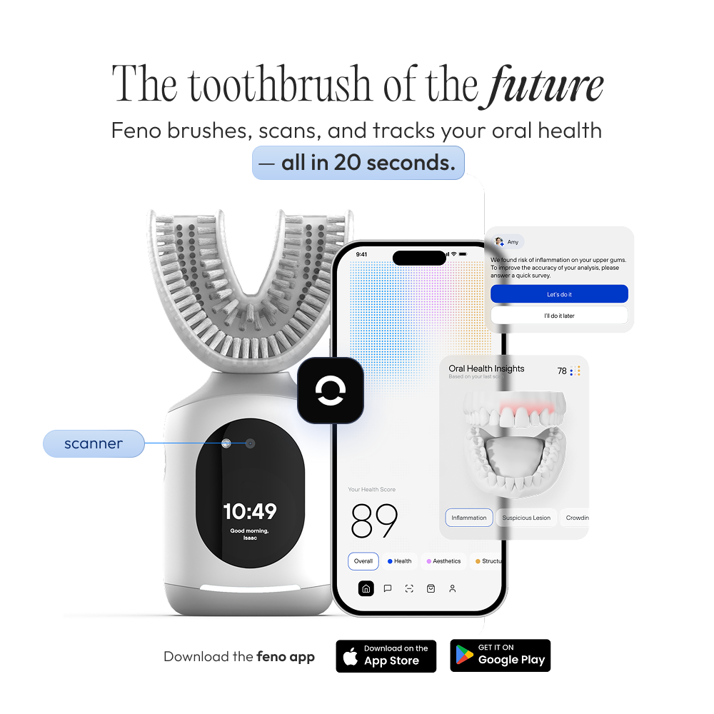 A Feno smart toothbrush and base next to a smartphone displaying the Feno oral health tracking app.