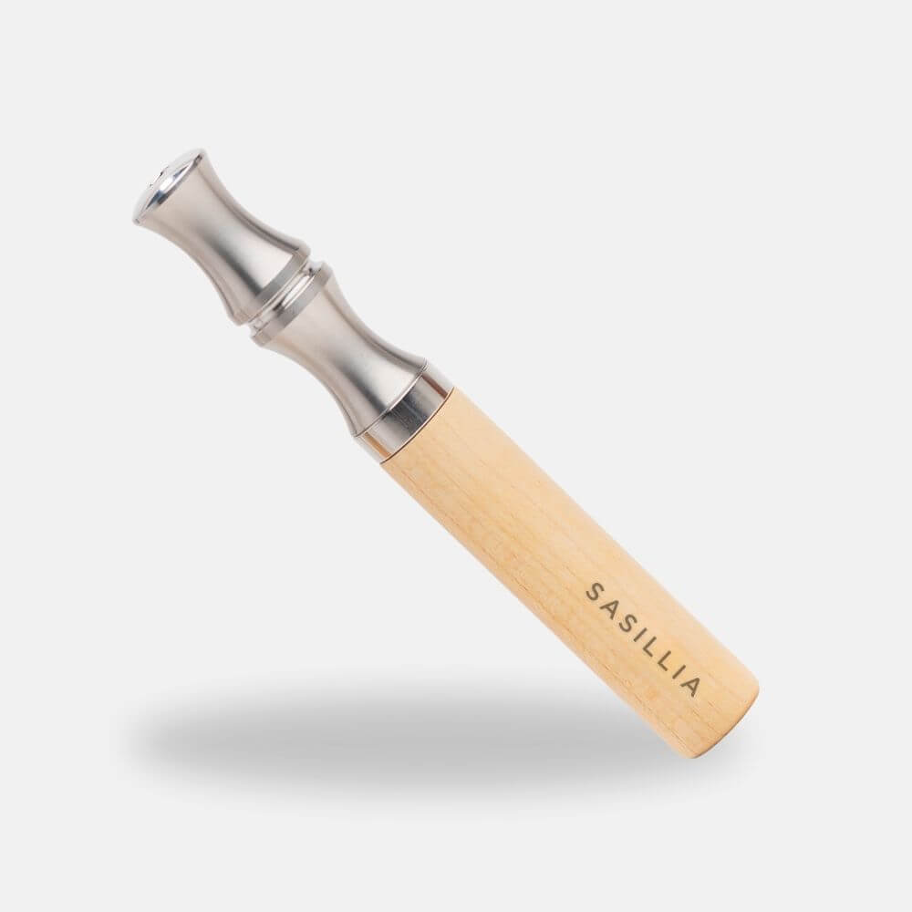 A wooden and metal smoking pipe with 'SASILIA' engraved on the handle.
