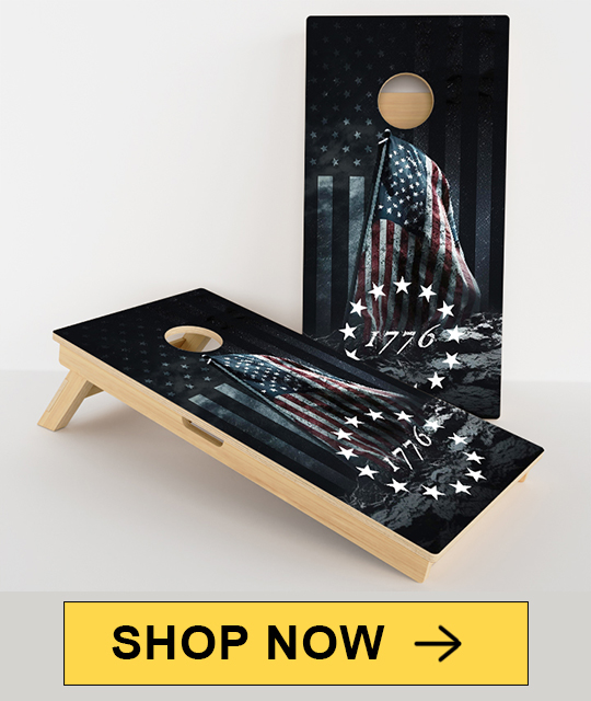 Patriotic cornhole boards with American flag design.