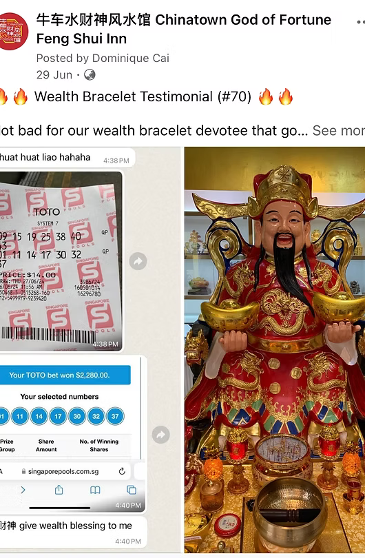 Lottery ticket and God of Fortune statue with gold ingots.