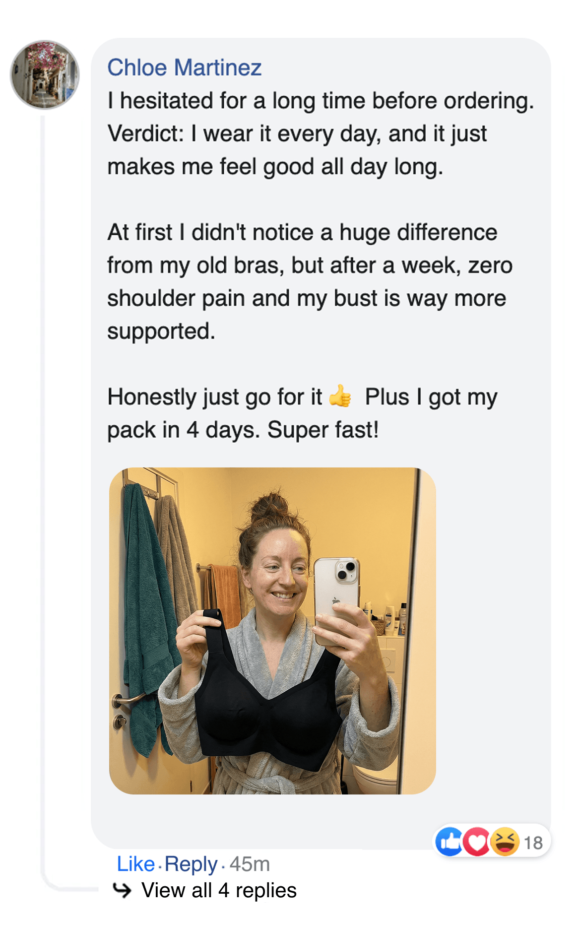 A screenshot of a customer review, including a photo of the woman smiling and holding up a black bra.