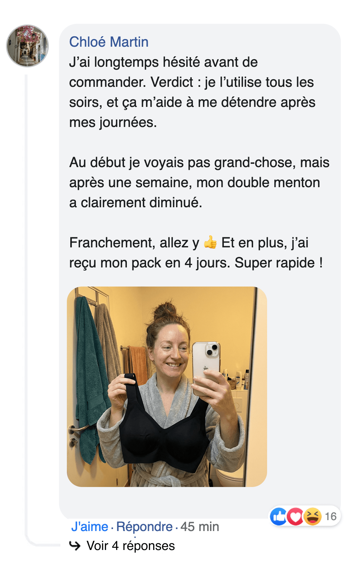 A screenshot of a social media post showing a woman in a robe taking a mirror selfie holding a black bra.