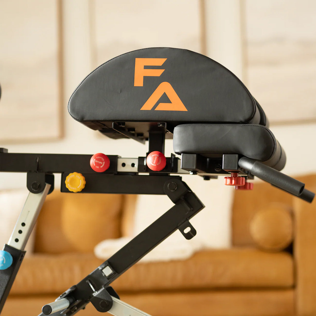 Adjustable exercise bench with logo and colorful knobs.