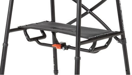 A close-up of a black metal step ladder detail.